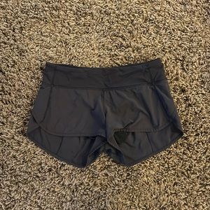 LULULEMON speed up shorts in black size 6.